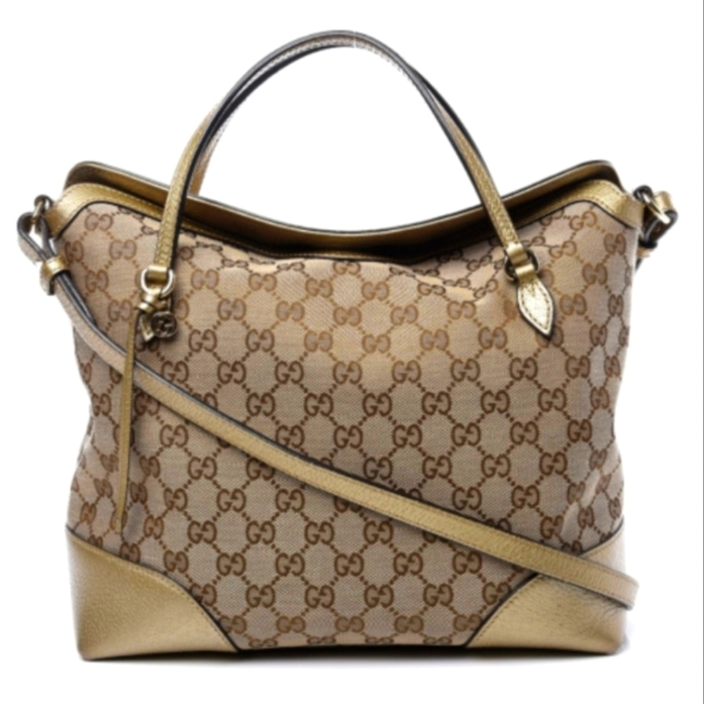 Gucci gold fold over medium bag